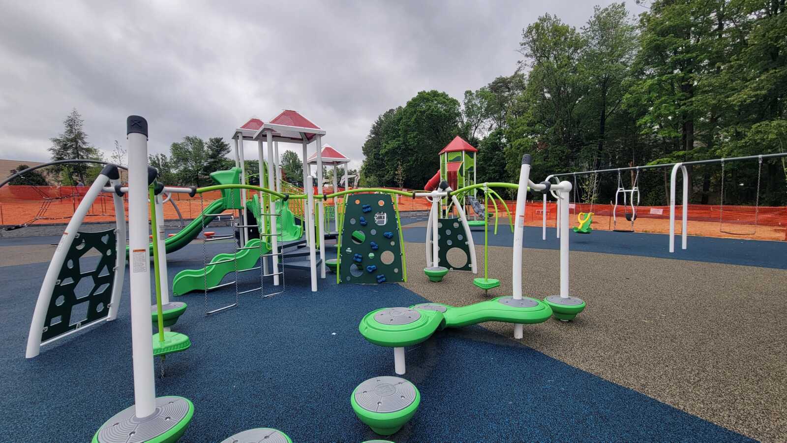 Neon green playground equipment at Reston North