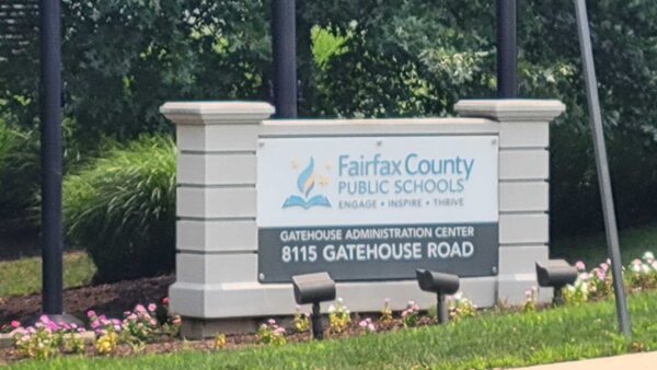 Sign for Fairfax County Public Schools with logo and the text ‘Gatehouse Administration Center, 8115 Gatehouse Road’.