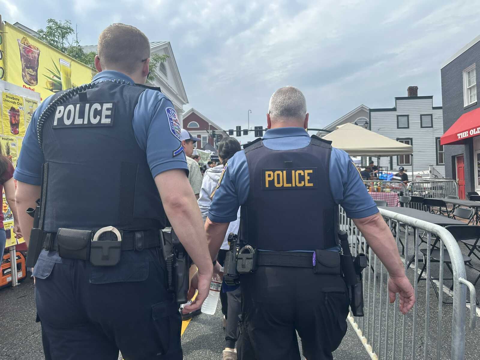 Fairfax City police officers at the 2026 Asian Festival on Main (staff photo by Angela Woolsey) | FFXnow