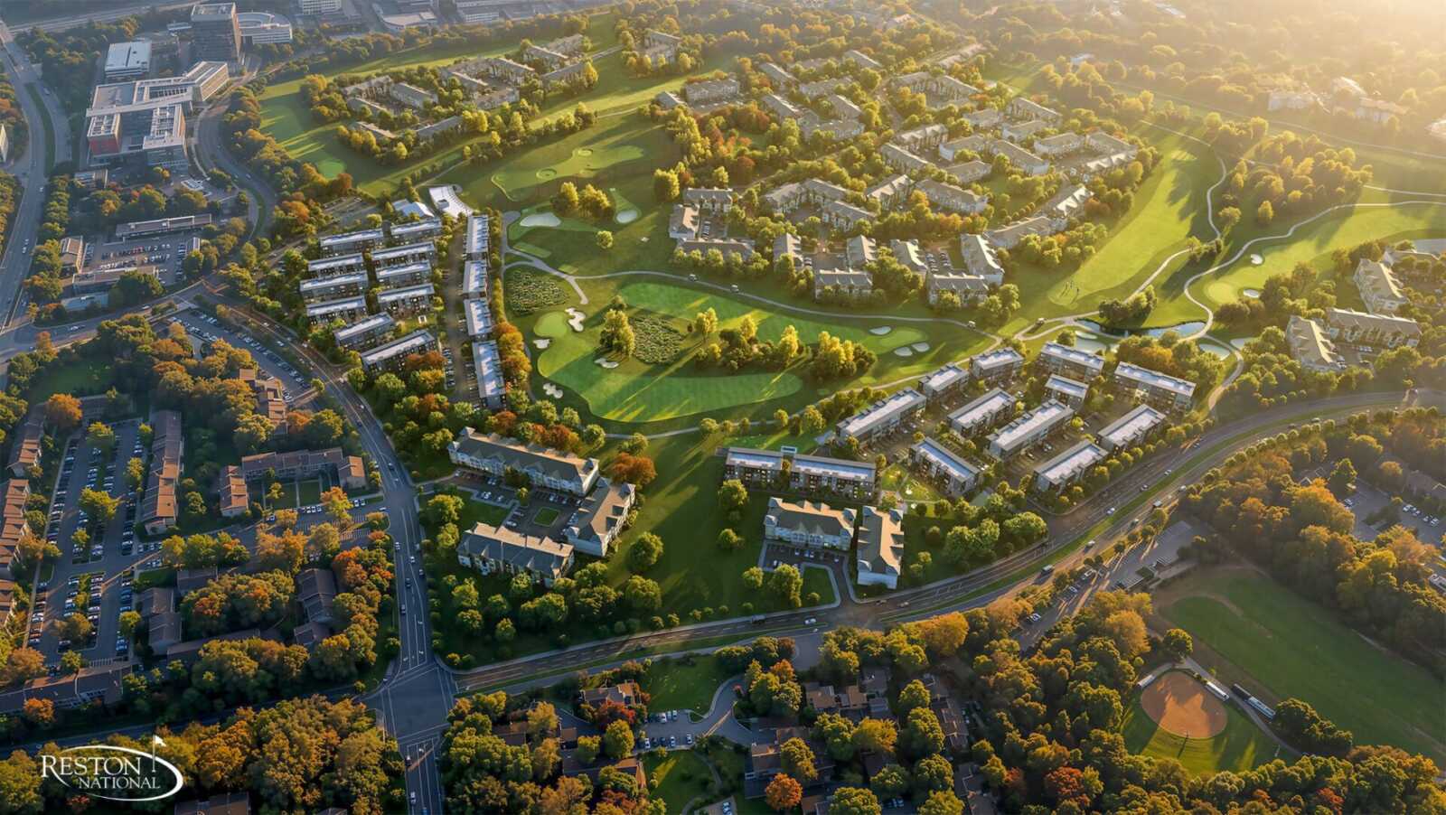 Aerial view of a golf course surrounded by residential buildings, roads, and autumn-colored trees in a suburban area, Reston National logo visible in the corner.