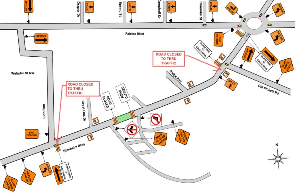 Map of road closures and detours around a roundabout at Fairfax Blvd and Old Pickett Rd, with orange 'Detour' signs and blocked lanes indicating thru-traffic restrictions.