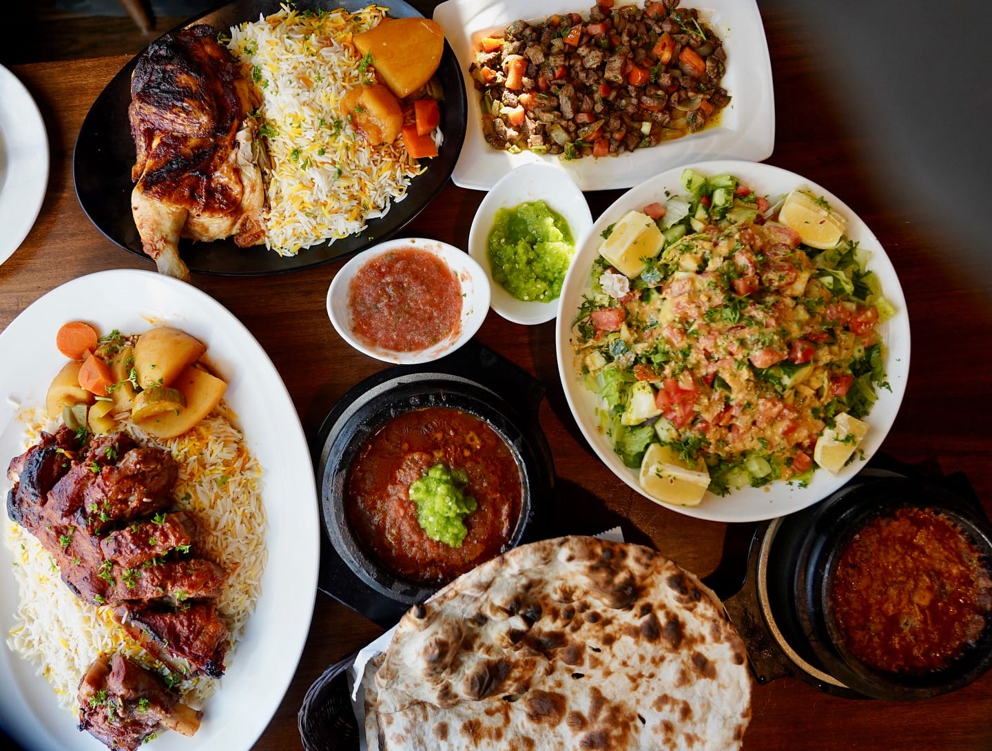 Array of food, including haneeth and fahsah, from Sheeba (courtesy Sheeba) | FFXnow