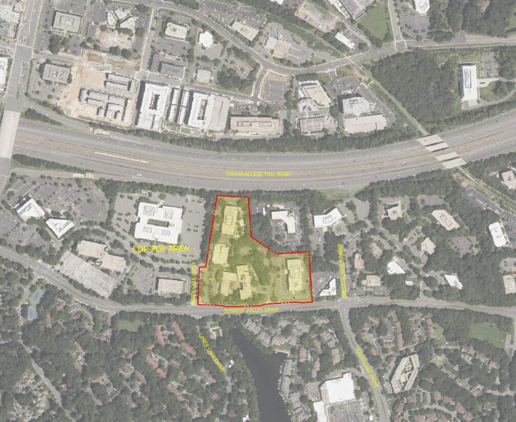 Aerial view showing a parcel outlined in red along Sunrise Valley Drive, labeled CDP-PDP Area, with surrounding roads and buildings nearby.
