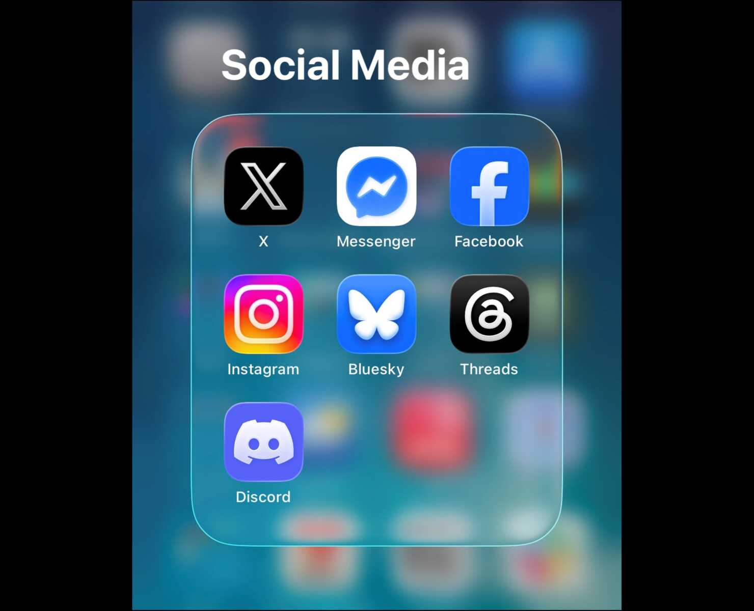Screenshot of social media mobile apps | FFXnow Folder labeled Social Media displaying icons for X, Messenger, Facebook, Instagram, Bluesky, Threads, and Discord on a smartphone screen.