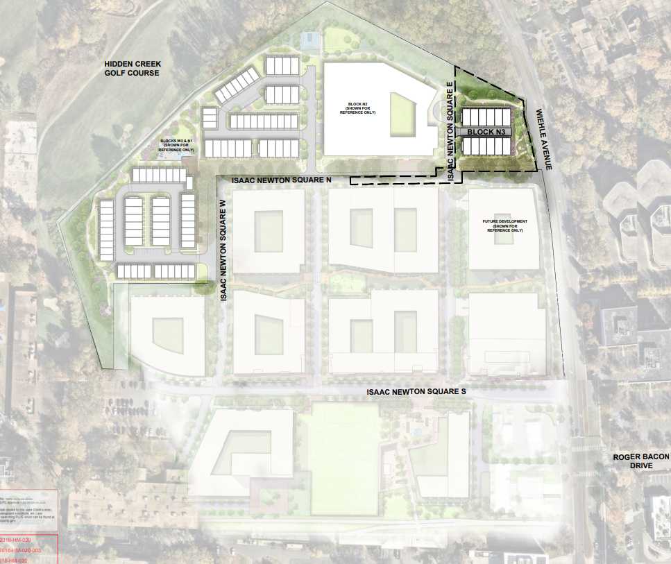 Aerial site plan of a development around Isaac Newton Square, showing multiple blocks, parking areas, and surrounding streets.