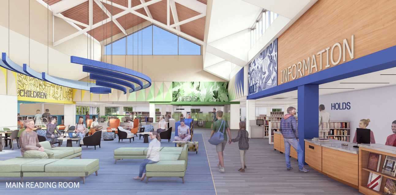 Bright library lobby with colorful seating and lounge areas, information desk to the right, and a large glass ceiling.