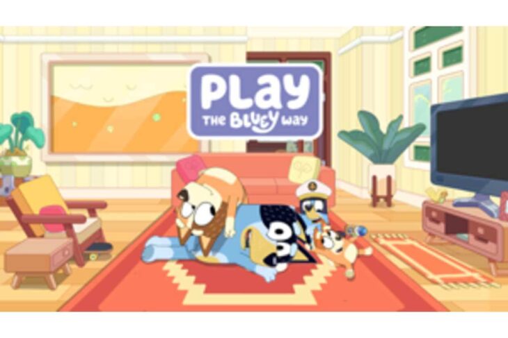 Cartoon living room with a red rug and several playful characters resting on it under a sign that says, 'Play The Bluey Way'.