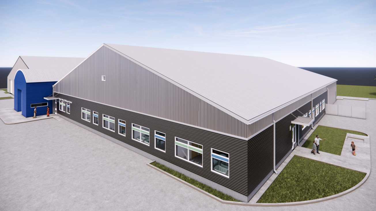 Rendering of Hybla Valley Community Center expansion with child care center (via Fairfax County staff report) | FFXnow Modern warehouse exterior with gray metal siding, a blue annex, and a large sloped roof; people near the entrance and a curved sidewalk nearby.