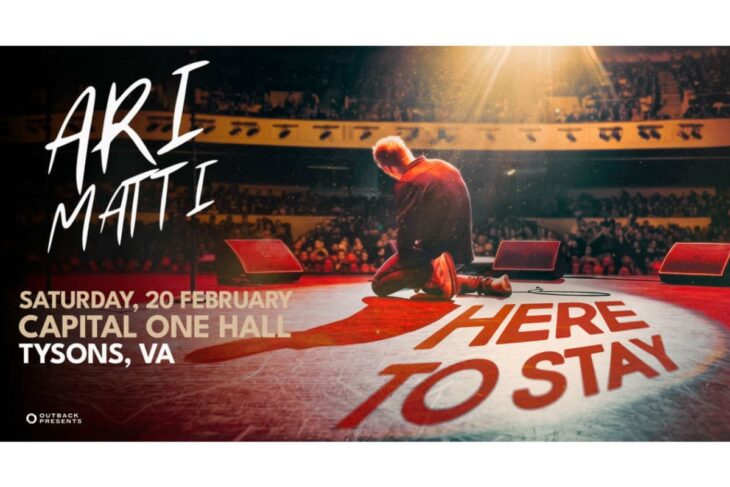 Poster for a live event: a performer kneels on a lit stage with an audience, bold text on the floor reads 'HERE TO STAY' and event details (Saturday, 20 February, Capital One Hall, Tysons, VA).
